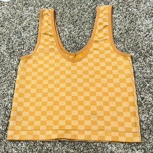 Dark and light orange checkered cropped tank top. Fits size XS-S